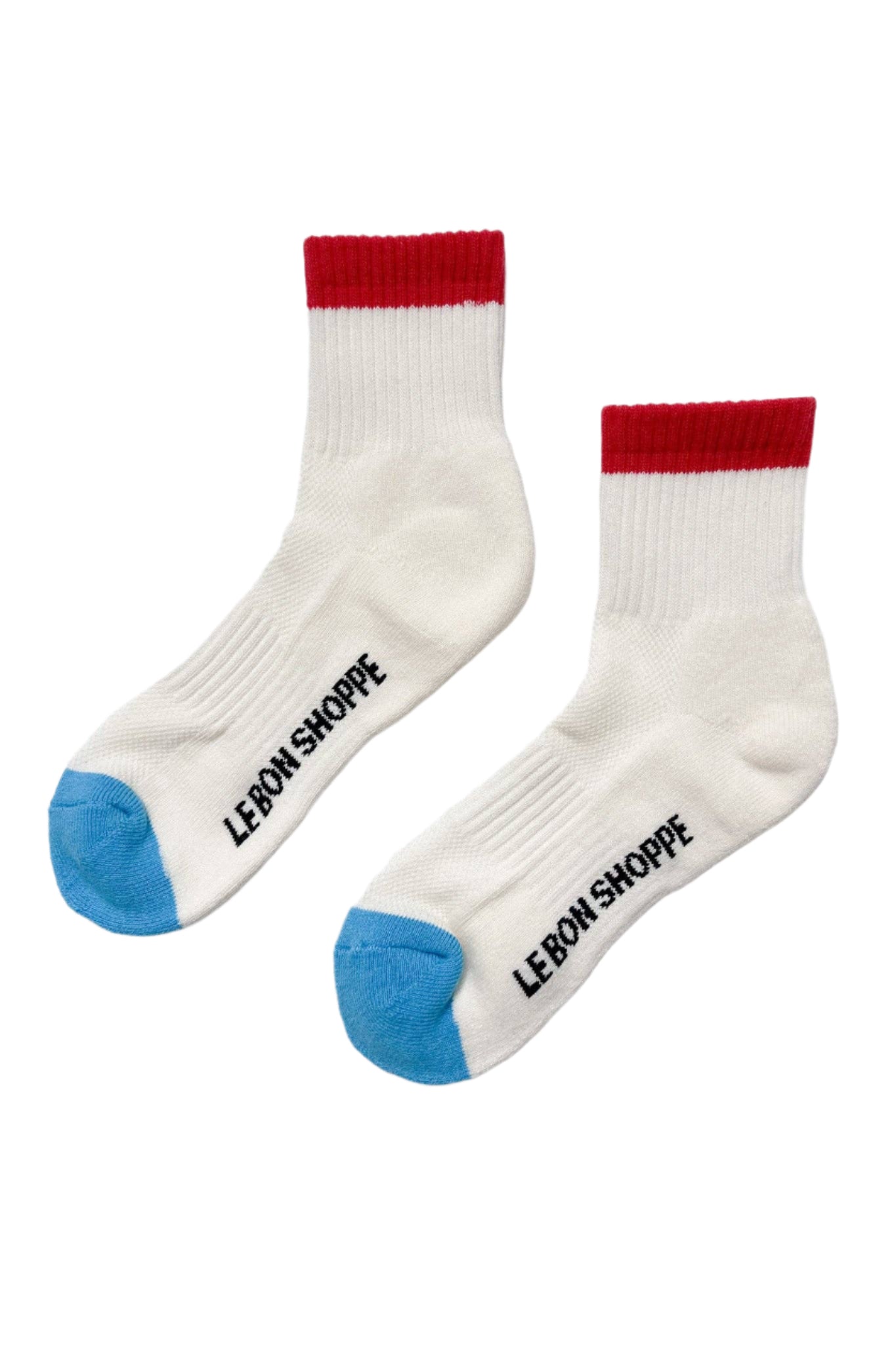 A pair of color block girlfriend socks with gray body and pink detailing on the ankle and toe.