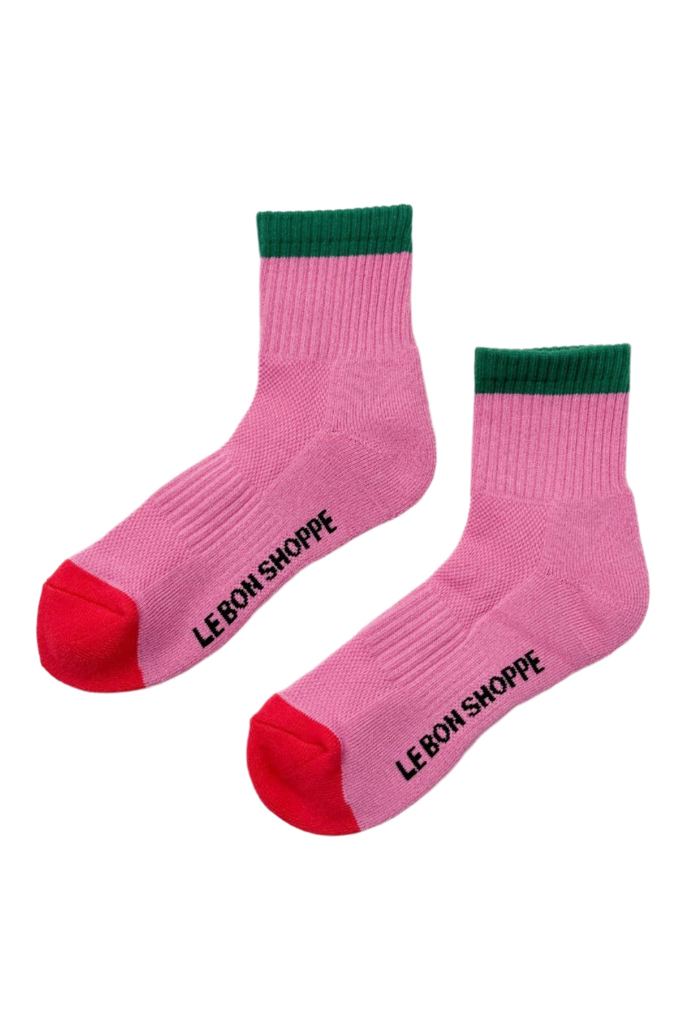 A pair of color block girlfriend socks with gray body and pink detailing on the ankle and toe.